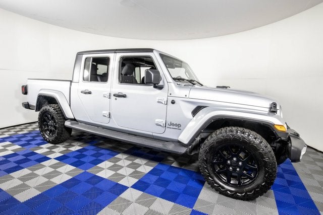 2023 Jeep Gladiator Overland in Silver Zynith Clearcoat — front three-quarter view