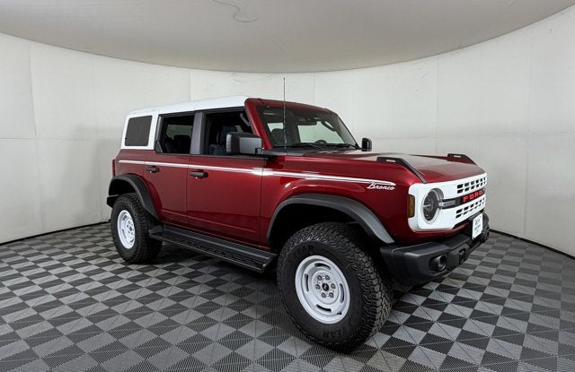 2026 Ford Bronco Heritage Edition in Ruby Red Metallic — front three-quarter view