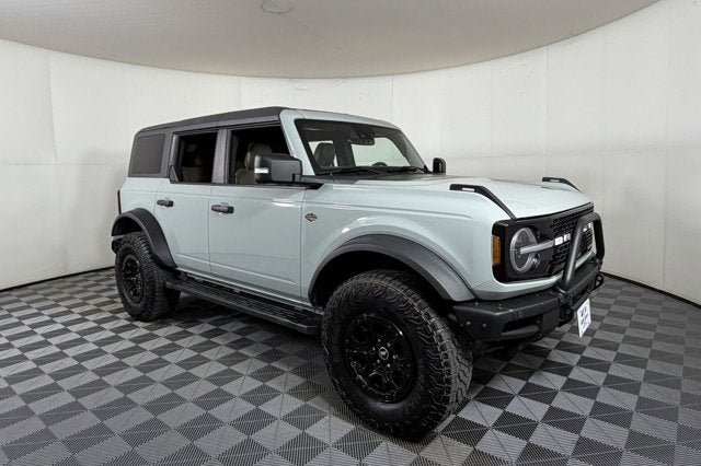 2023 Ford Bronco Wildtrak in Cactus Gray — front three-quarter view