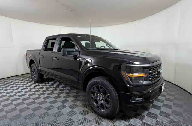 2026 Ford F-150 STX in Black Metallic — front three-quarter view