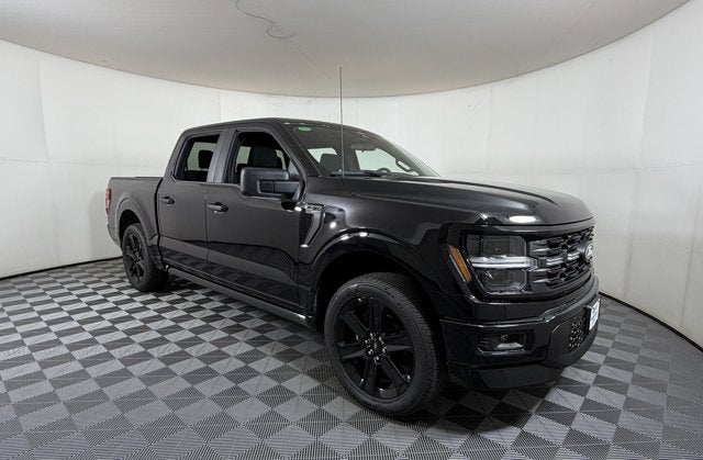 2026 Ford F-150 STX in Black Metallic — front three-quarter view