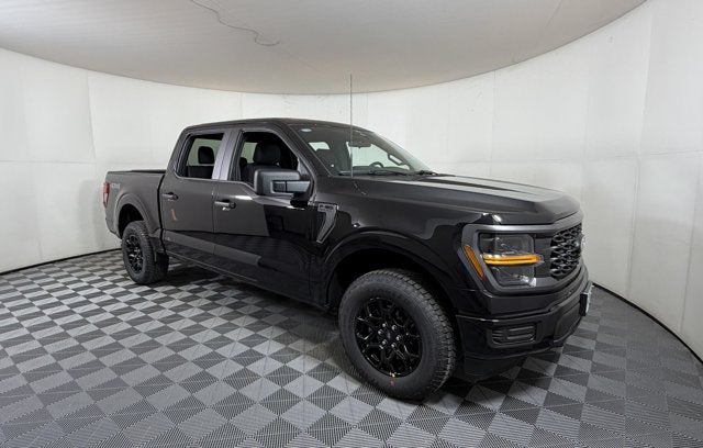 2026 Ford F-150 STX in Black Metallic — front three-quarter view