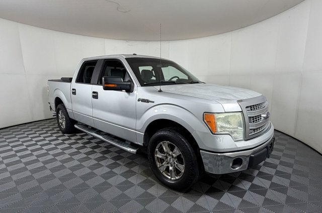 2014 Ford F-150 XLT in Ingot Silver — front three-quarter view