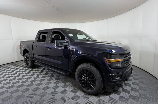 2026 Ford F-150 XLT in Blue Metallic — front three-quarter view