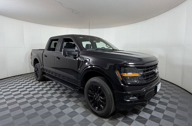 2026 Ford F-150 XLT in Black Metallic — front three-quarter view