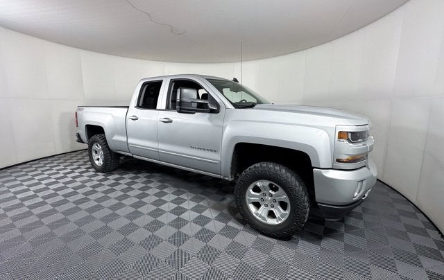 2017 Chevrolet Silverado 1500 LT in Silver Ice Metallic — front three-quarter view