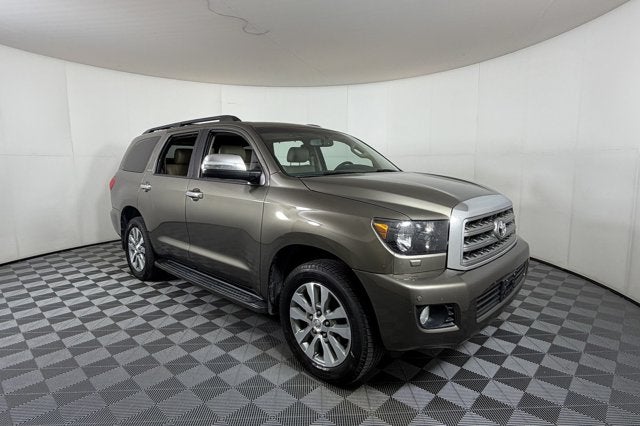 2017 Toyota Sequoia Limited in Pyrite Mica — front three-quarter view